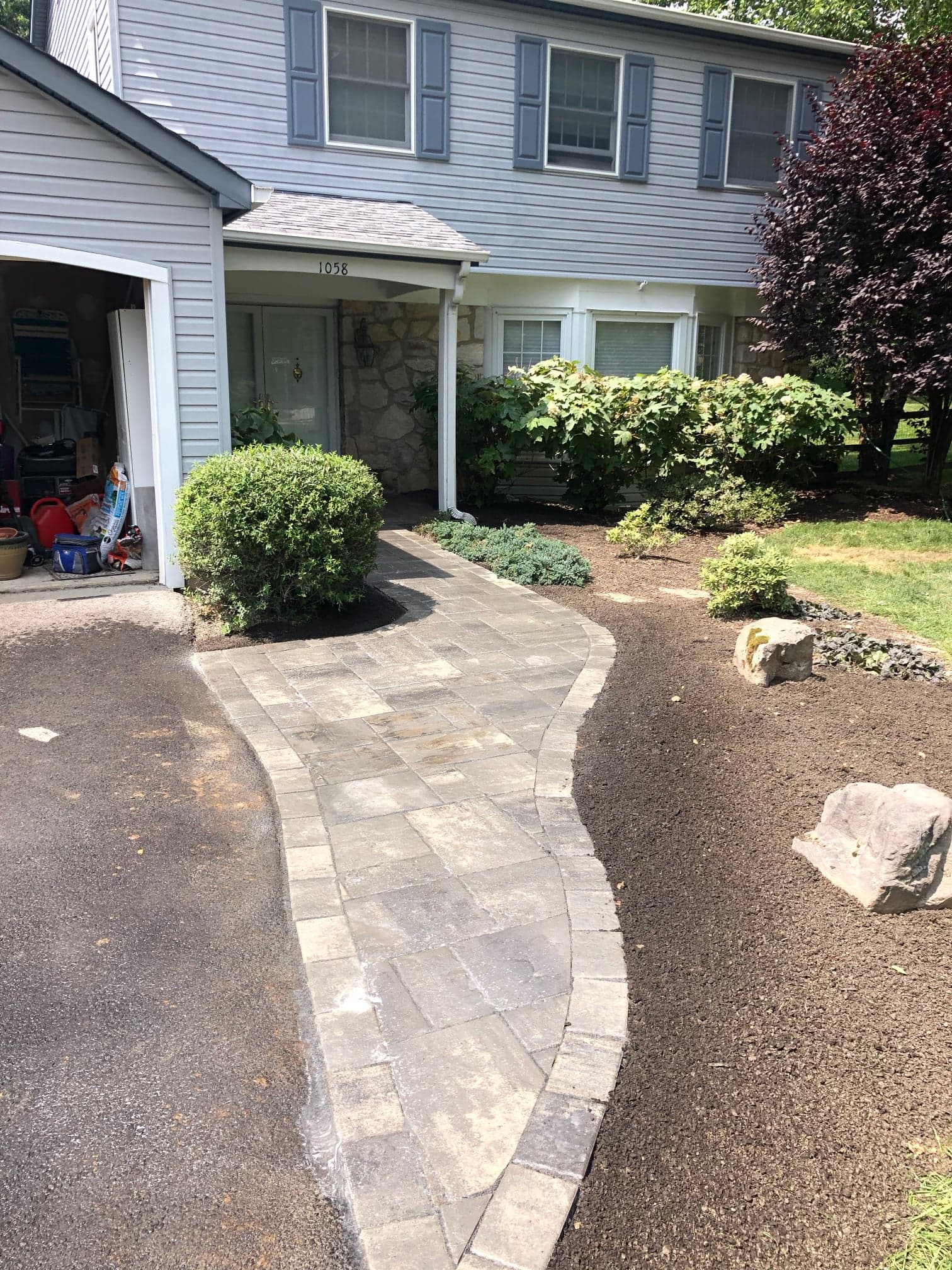 Completed patio project by Natalini Masonry in Bucks County PA