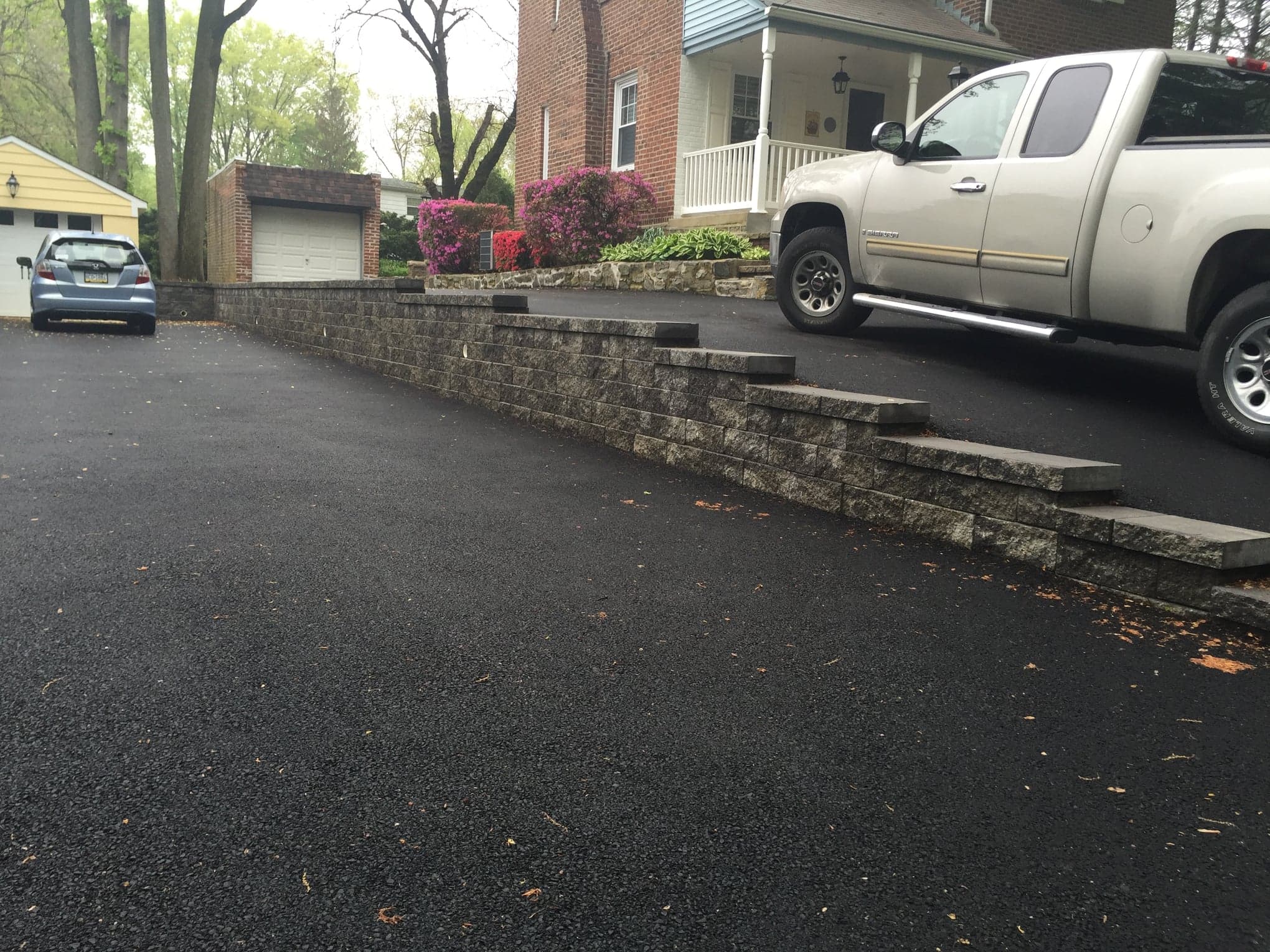 Landscape retaining wall by Natalini Masonry in Bucks County PA