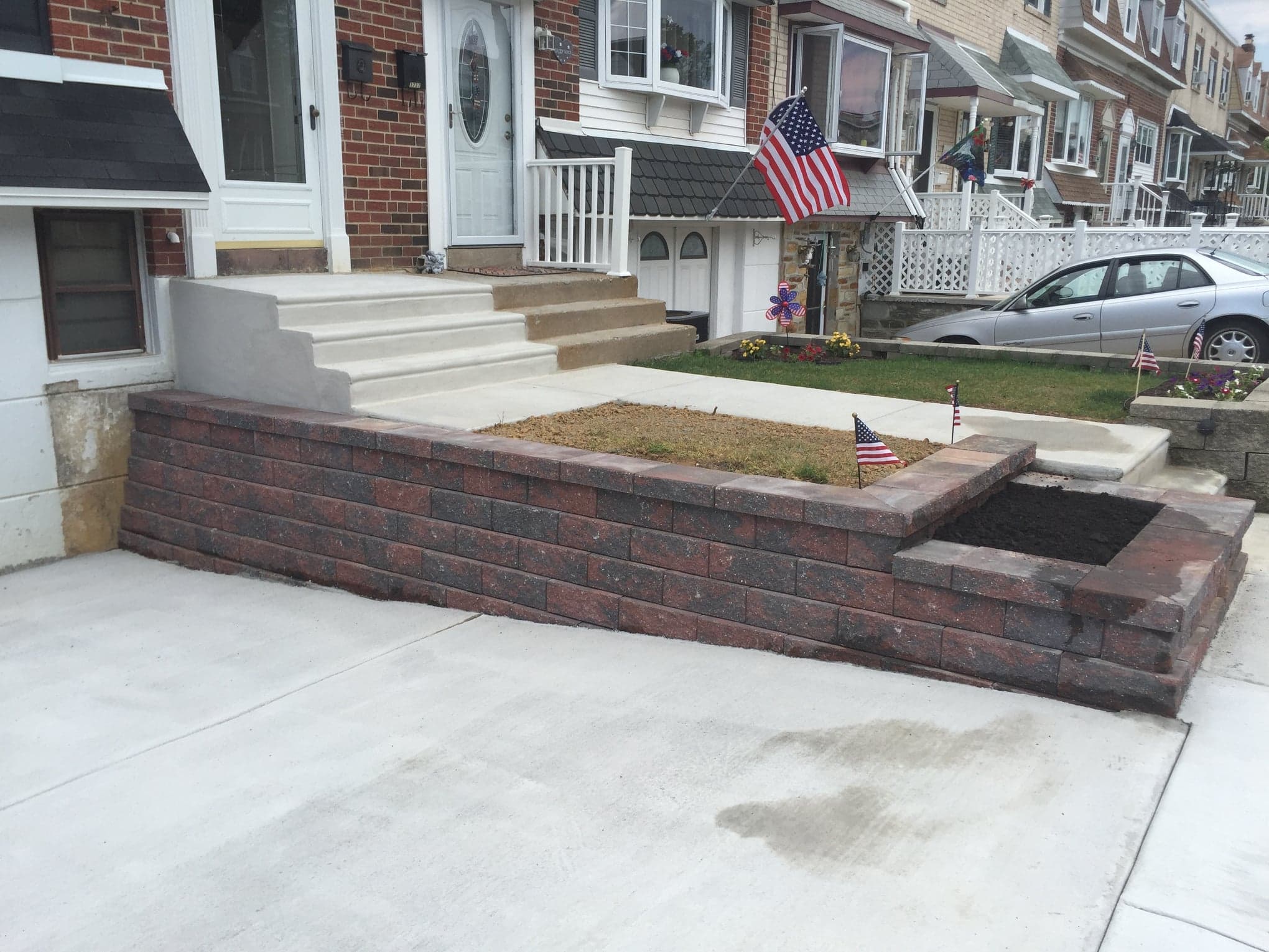Tiered retaining wall installation by Natalini Masonry in Bucks County PA