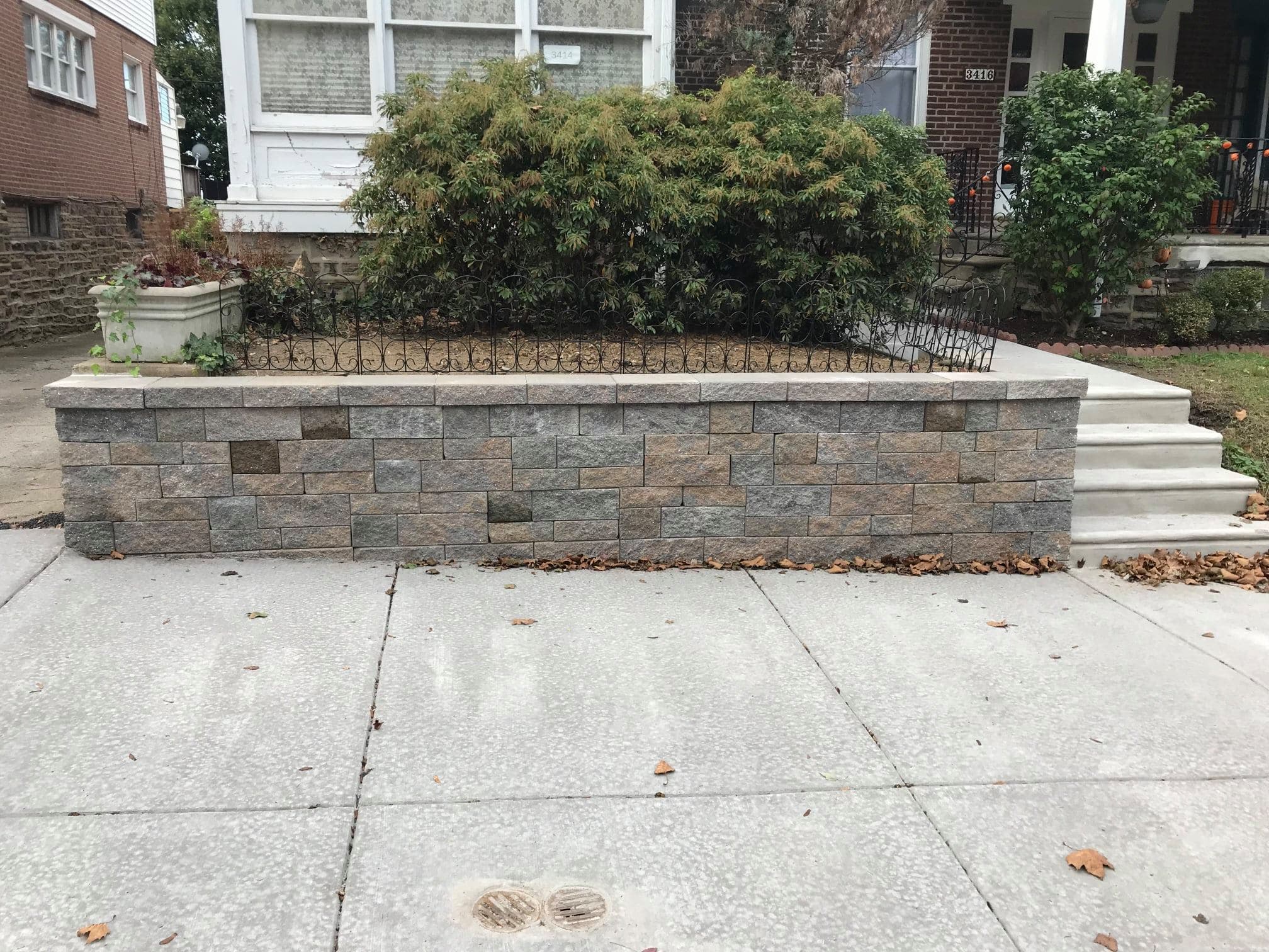 Finished retaining wall by Natalini Masonry in Bucks County PA
